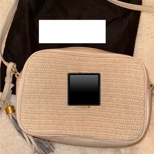 Cute straw crossbody bag new! Comes with dust bag